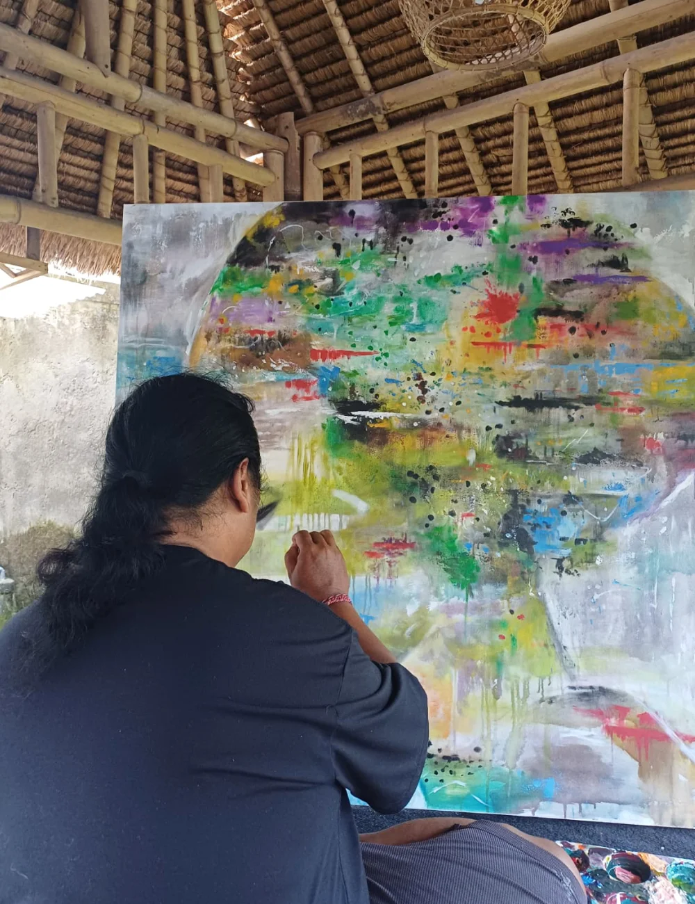 Painting process at Mayon Art Studio